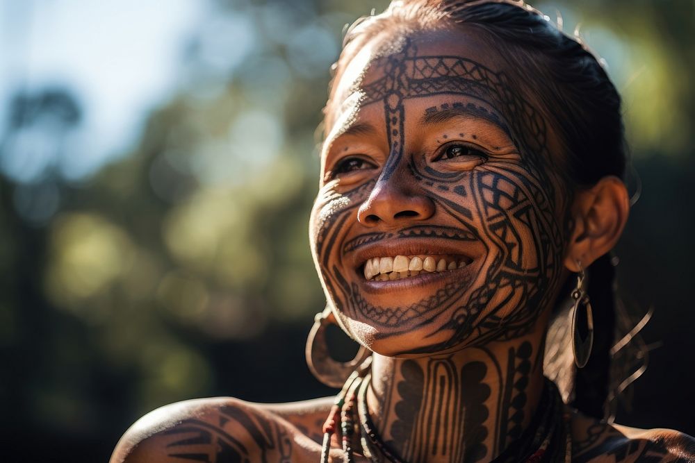 Indigenous woman tattoo smiling tribe. AI generated Image by rawpixel.