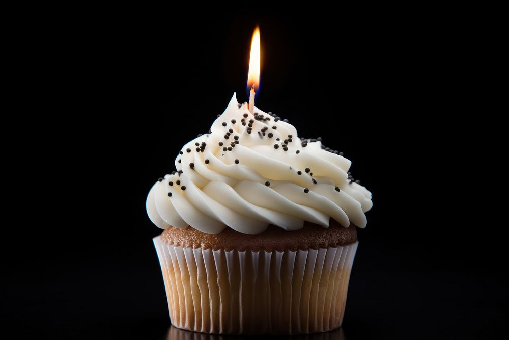 Cupcake dessert candle icing. AI generated Image by rawpixel.