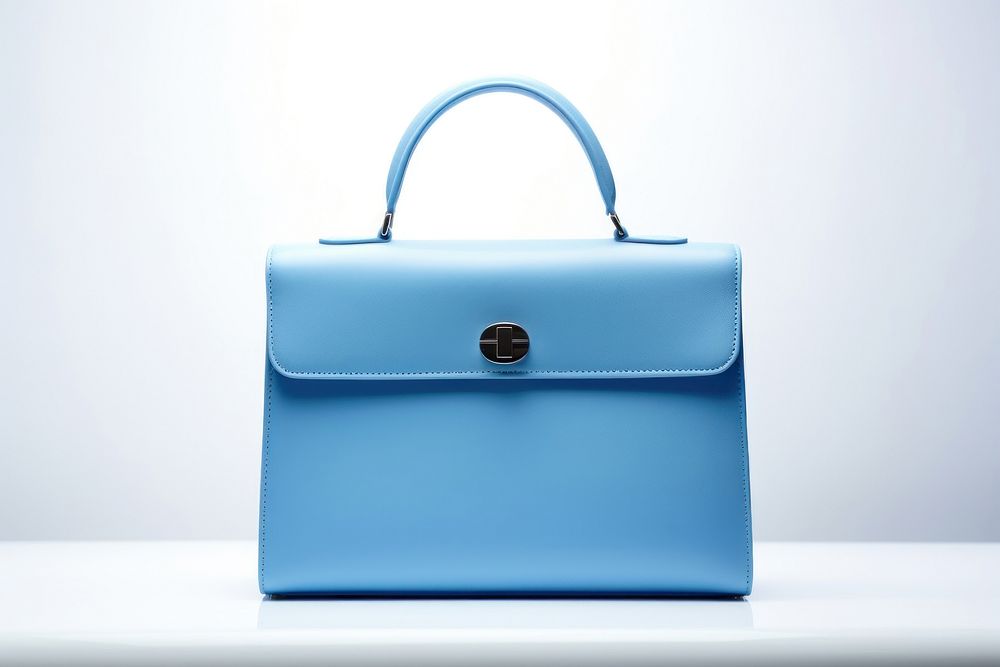 Luxury minimal blue handbag briefcase purse accessories. AI generated Image by rawpixel.