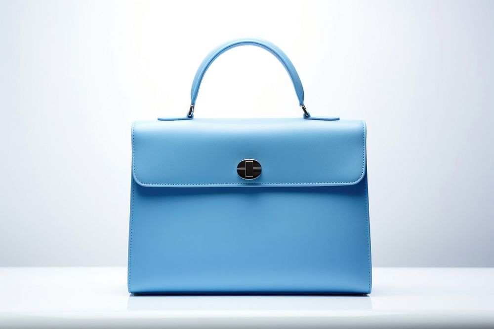 Luxury minimal blue handbag briefcase purse accessories. 