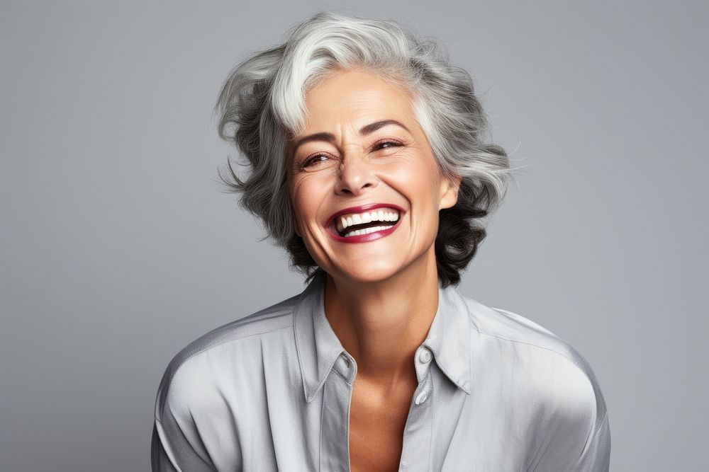 Senior model woman laughing portrait smiling. 