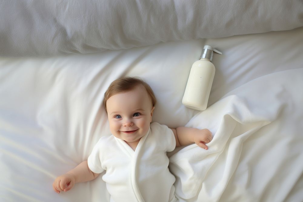 A white lotion package baby bed portrait. AI generated Image by rawpixel.