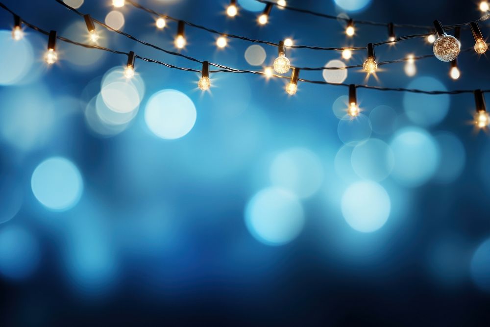 Background christmas garland lighting backgrounds hanging blue. AI generated Image by rawpixel.
