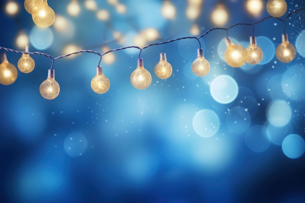 Background christmas garland lighting backgrounds lightbulb blue. AI generated Image by rawpixel.