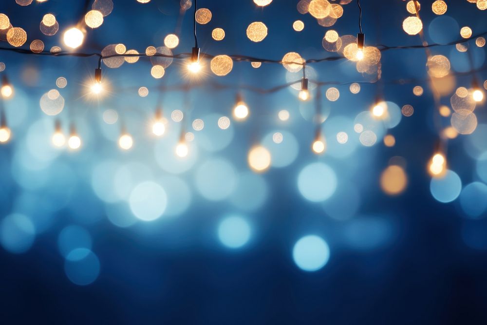 Background christmas garland lighting backgrounds blue illuminated. AI generated Image by rawpixel.