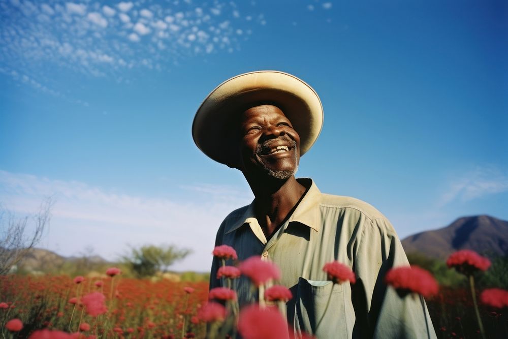 South african man portrait flower photography. AI generated Image by rawpixel.