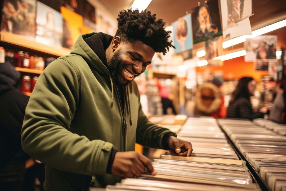Black man buying a record at a music store adult concentration publication. AI generated Image by rawpixel.