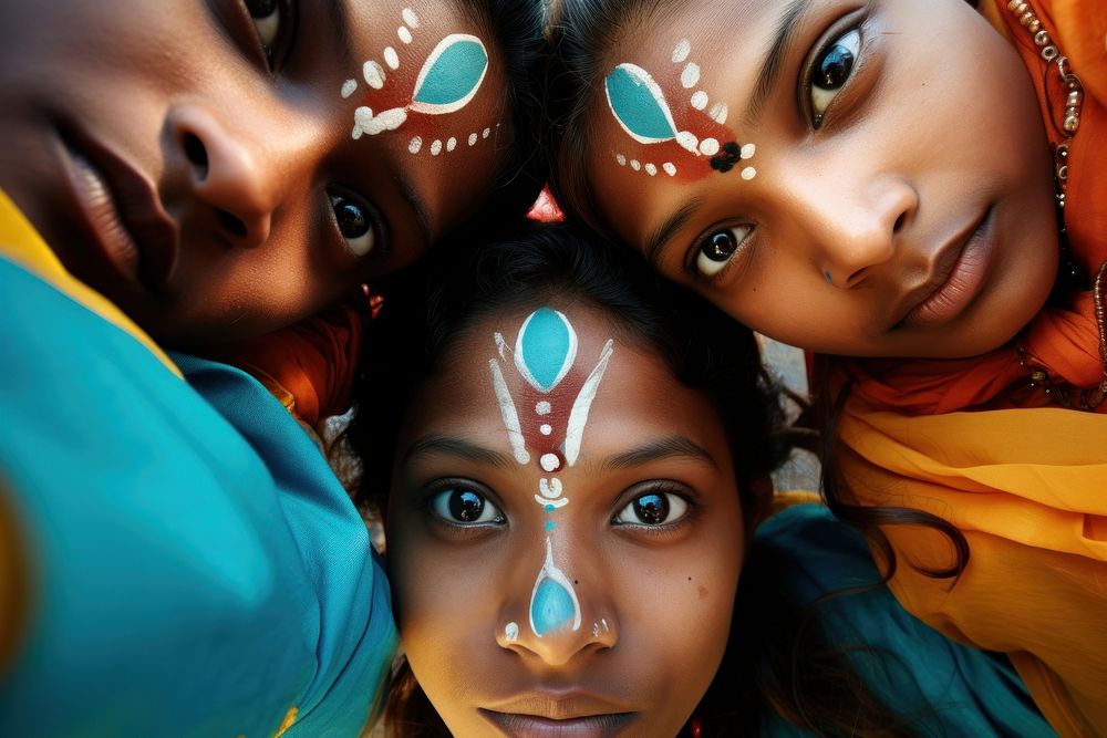 Four indians valunteer forming huddle portrait jewelry head. AI generated Image by rawpixel.