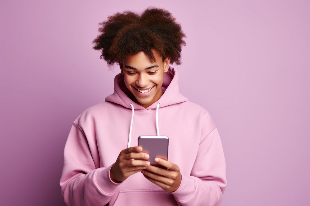 African American teenage holding purple hoodie. AI generated Image by rawpixel.