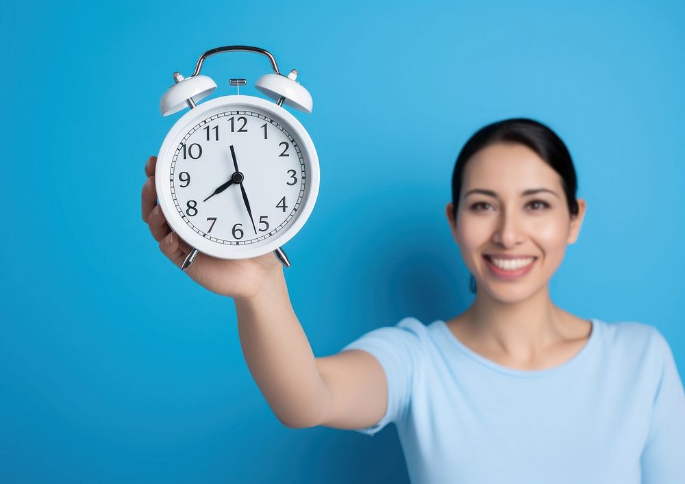 Clock adult woman blue. AI generated Image by rawpixel.