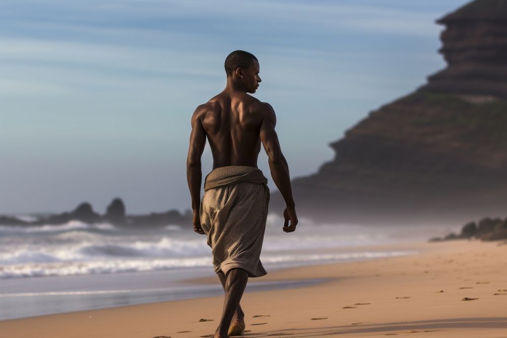 Black South African man walking beach adult. AI generated Image by rawpixel.