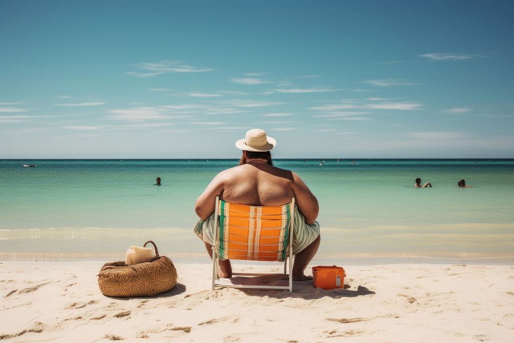South African man vacation beach sunbathing. AI generated Image by rawpixel.