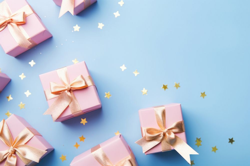 Pastel pink gifts with golden bows and ribbons placed on blue background near stars backgrounds celebration anniversary. AI…