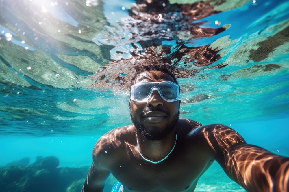 South African man snorkeling underwater recreation swimming. AI generated Image by rawpixel.