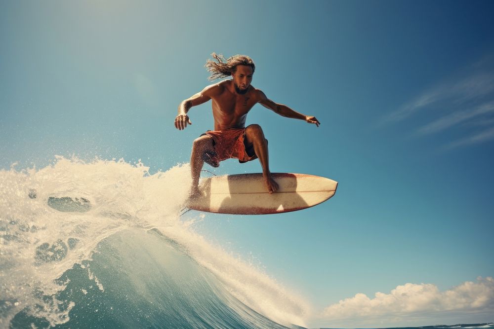 South African man surfing sea recreation. AI generated Image by rawpixel.