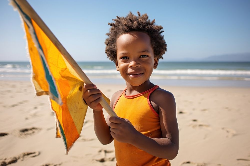 South African boy playing beach portrait outdoors. AI generated Image by rawpixel.