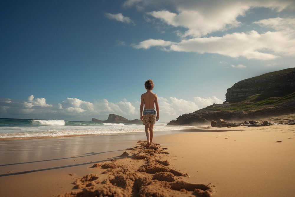 South African young boy walking beach outdoors. AI generated Image by rawpixel.
