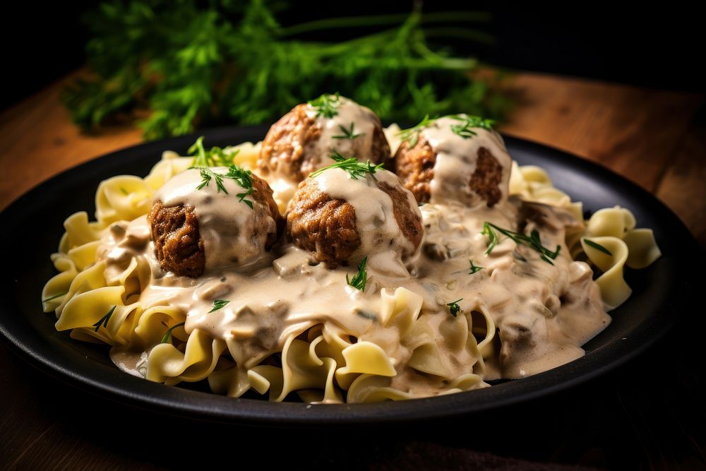 Meatball stroganoff plate food fettuccine. AI generated Image by rawpixel.