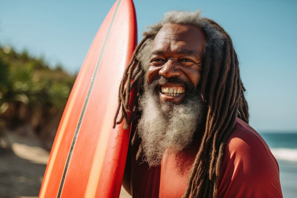 Black uncle outdoors smiling surfing. AI generated Image by rawpixel.