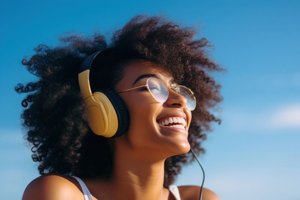 Black woman headphones listening glasses. AI generated Image by rawpixel.