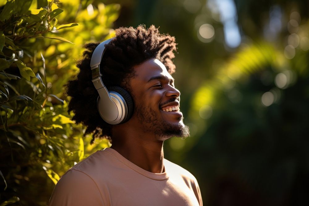 Black man headphones listening headset. AI generated Image by rawpixel.