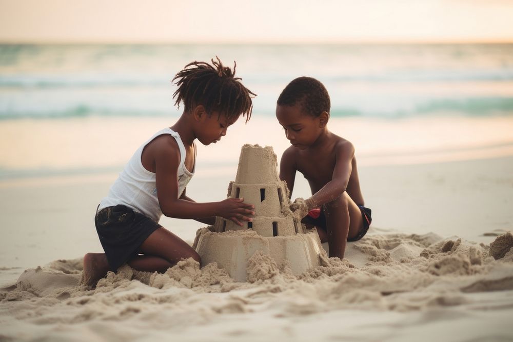 Black kids building sand castle outdoors summer child. AI generated Image by rawpixel.