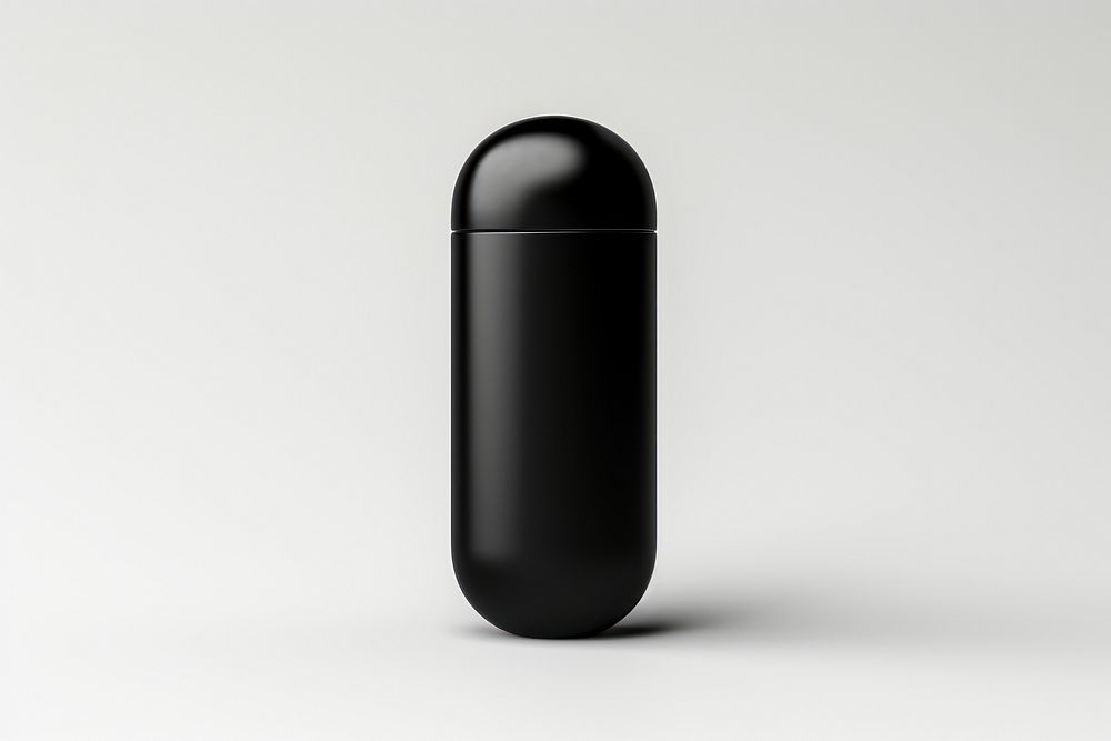 Capsule capsule bottle black. AI generated Image by rawpixel.