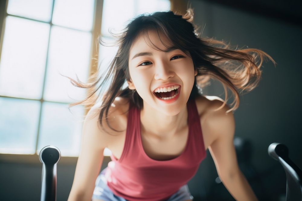 Japanese girl exercise looking happy and fun smile exercising happiness. AI generated Image by rawpixel.