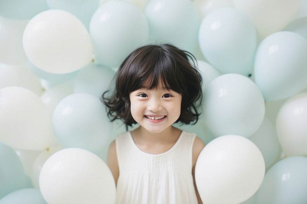 Japanese birthday party balloon child smile. AI generated Image by rawpixel.