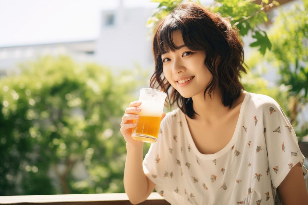Japanese woman holding beer drinking smiling summer. AI generated Image by rawpixel.