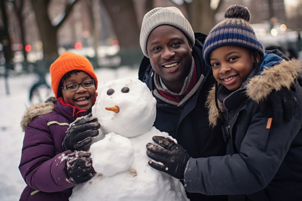 African family snowman winter outdoors. AI generated Image by rawpixel.