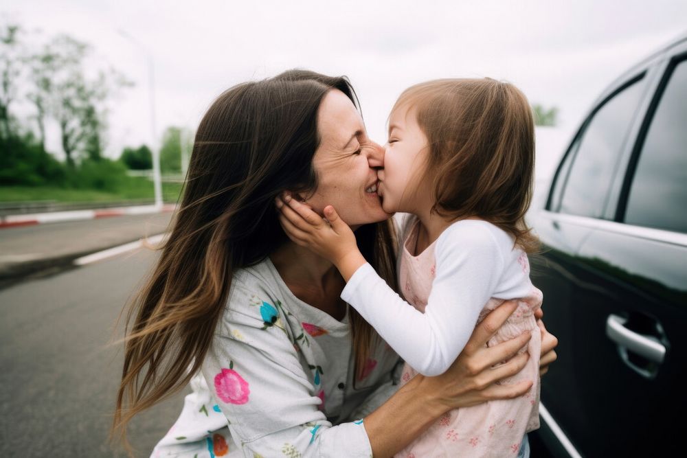 Mother embracing vehicle kissing. AI generated Image by rawpixel.