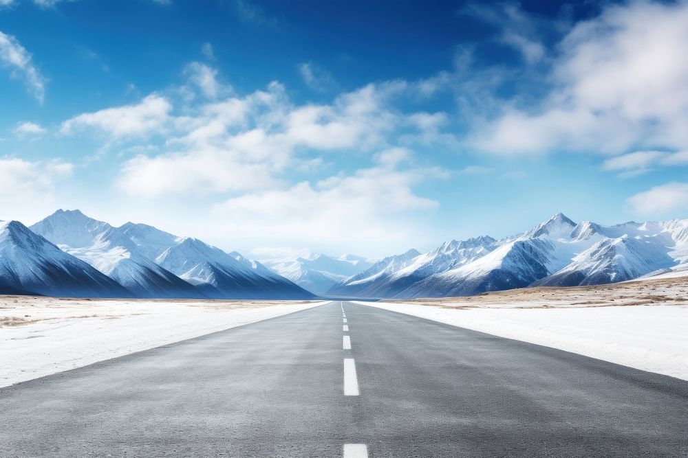 Asphalt road with snow mountains in blue cloud sky outdoors highway nature. AI generated Image by rawpixel.