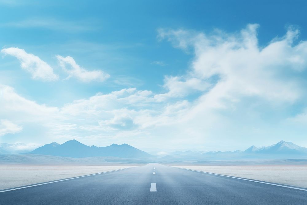 Asphalt road with snow mountains in blue cloud sky outdoors horizon highway. AI generated Image by rawpixel.