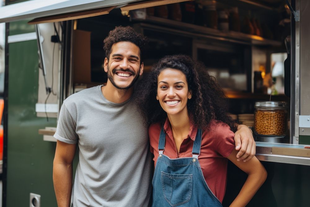 A multiracial couple in front of food truck smiling smile adult. AI generated Image by rawpixel.