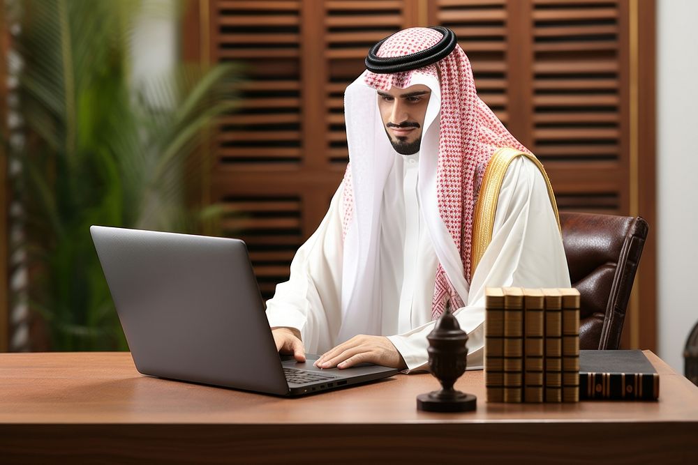 Saudi laptop computer adult. AI generated Image by rawpixel.