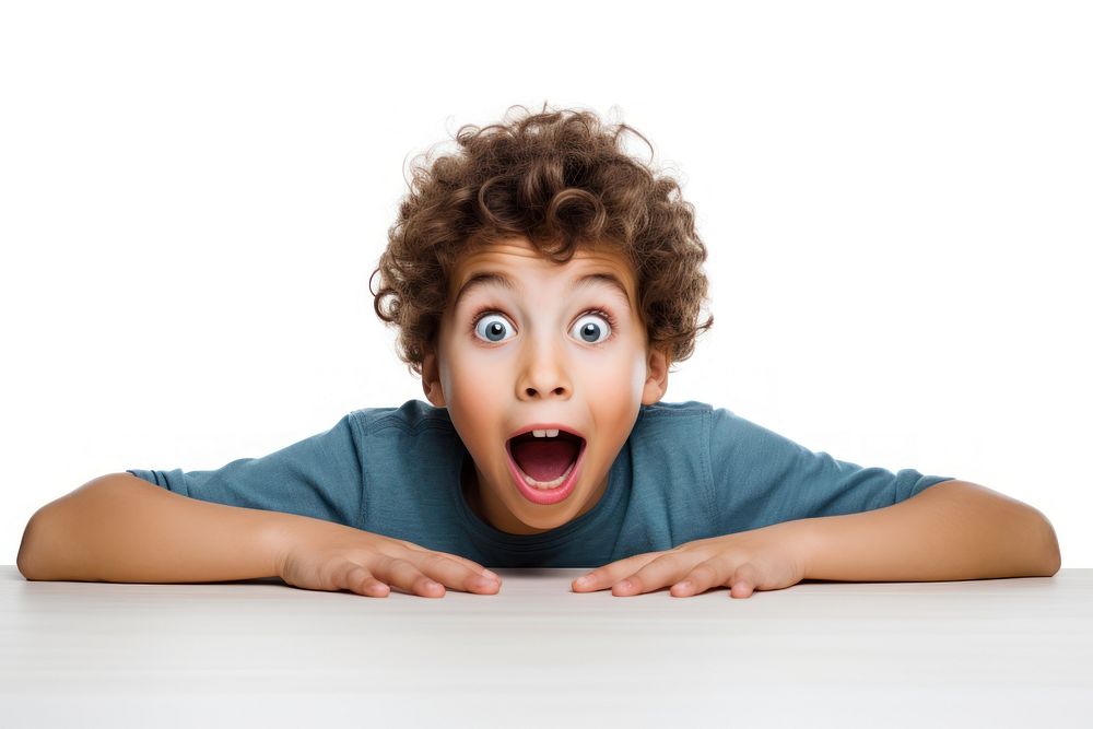 Surprised kid sitting at table face white background frustration. AI generated Image by rawpixel.
