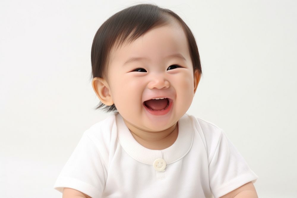 Cute baby asian laughing white background innocence happiness. AI generated Image by rawpixel.