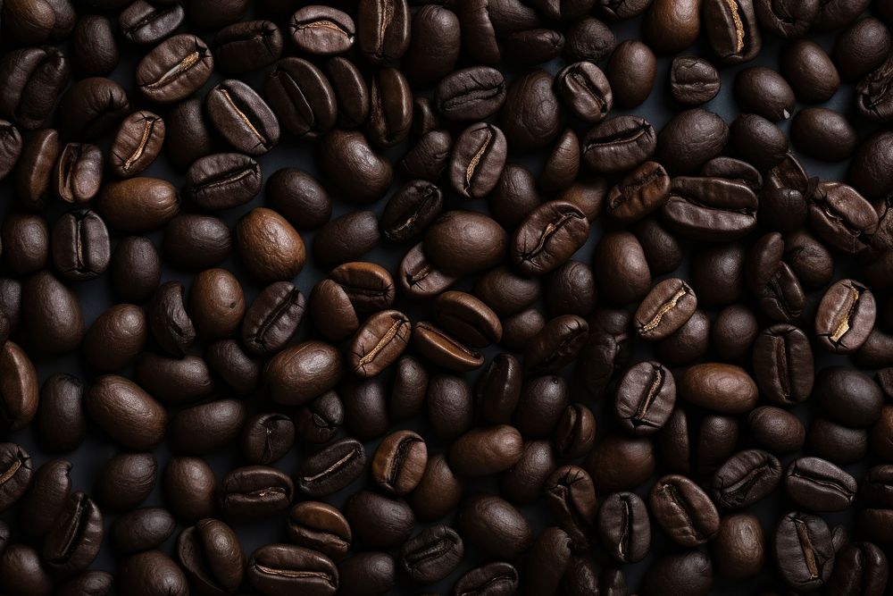 Coffee bean texture backgrounds coffee beans abundance. AI generated Image by rawpixel.