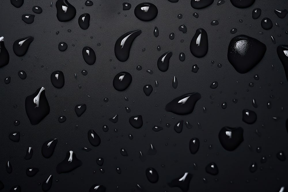 Water drop black backgrounds electronics. AI generated Image by rawpixel.