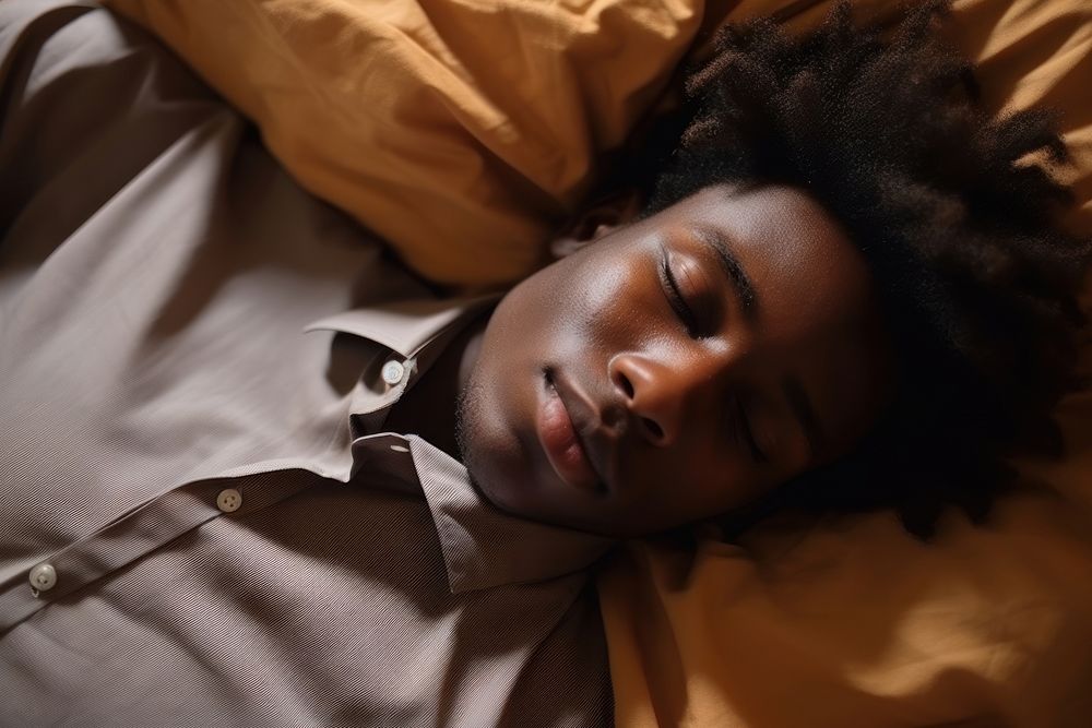 Black man teenager sleeping contemplation comfortable. AI generated Image by rawpixel.