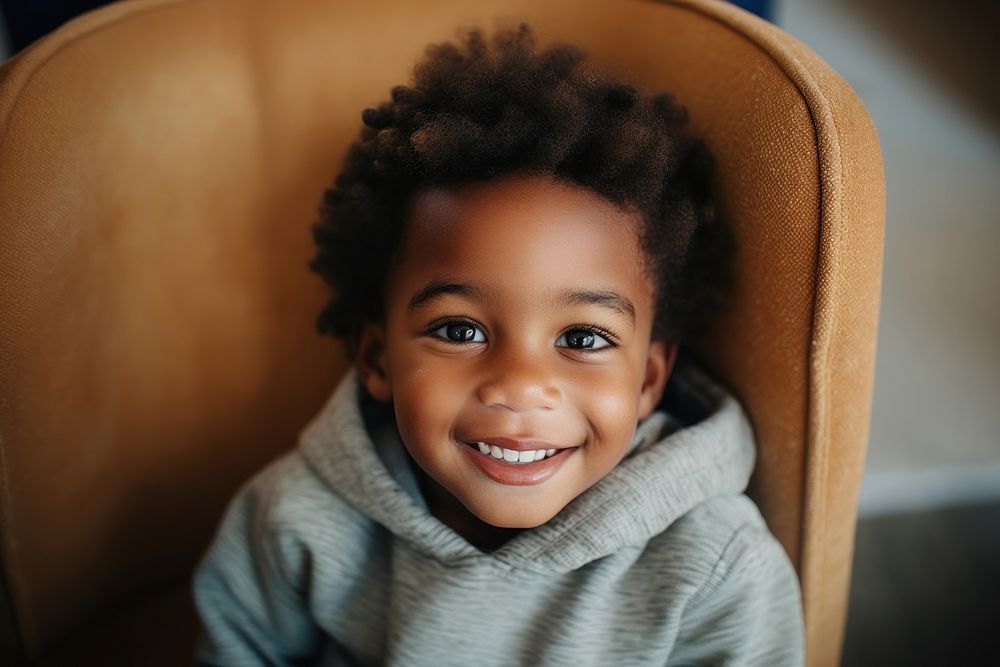 Black man child portrait smile photo. AI generated Image by rawpixel.
