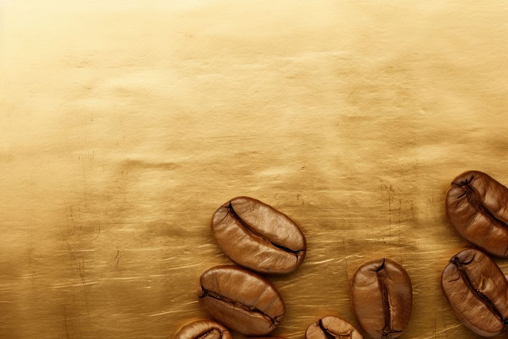 Coffee bean backgrounds gold coffee beans. AI generated Image by rawpixel.