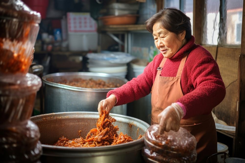 Making Kimchi adult woman food. AI generated Image by rawpixel.