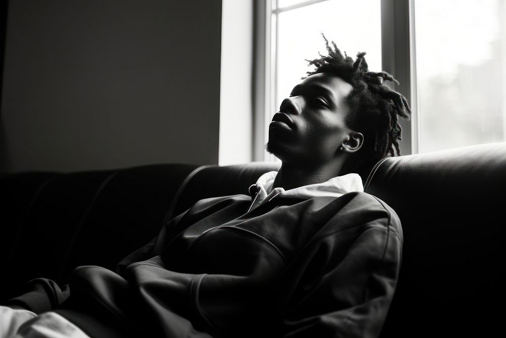 Black man teenager furniture portrait adult. AI generated Image by rawpixel.