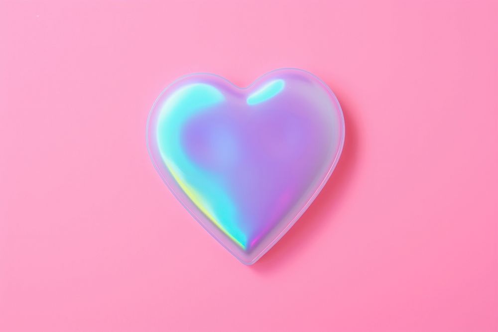 Heart wit eyes shape glowing jewelry. AI generated Image by rawpixel.