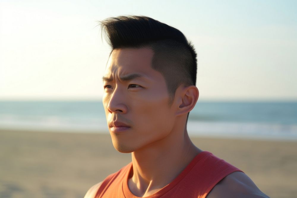 Muscles Taiwanese man beach contemplation tranquility. AI generated Image by rawpixel.