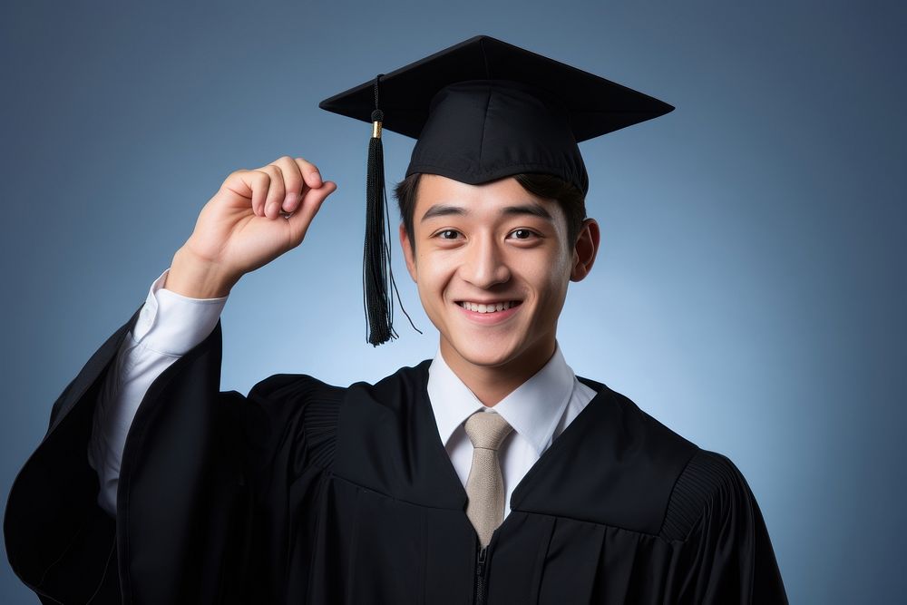 A student graduation taiwanese men intelligence achievement certificate. AI generated Image by rawpixel.