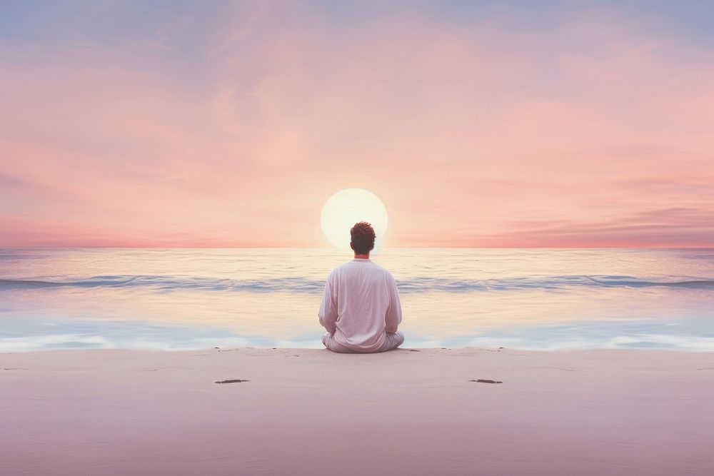 Man wearing white meditating on the beach sky sea outdoors. AI generated Image by rawpixel.