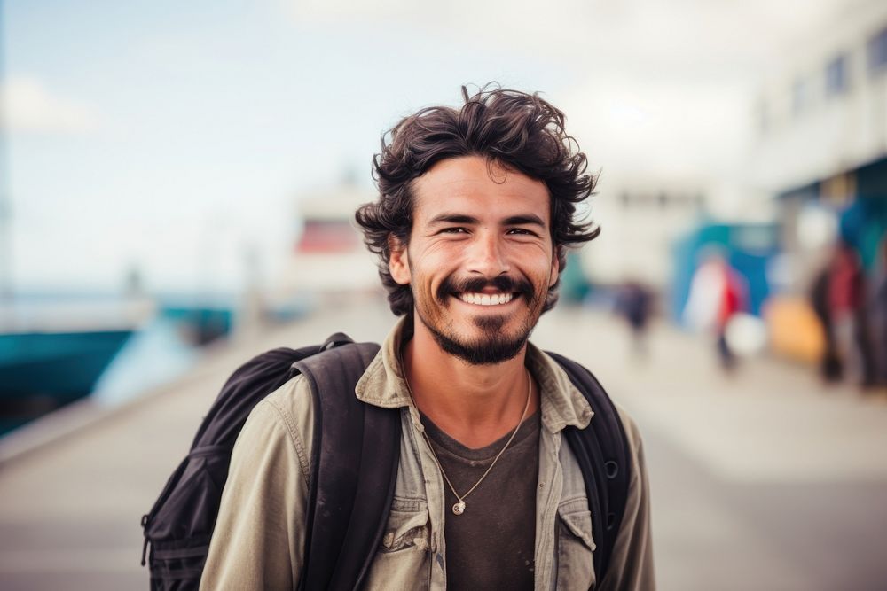 Mexican man backpacker laughing standing smiling. AI generated Image by rawpixel.